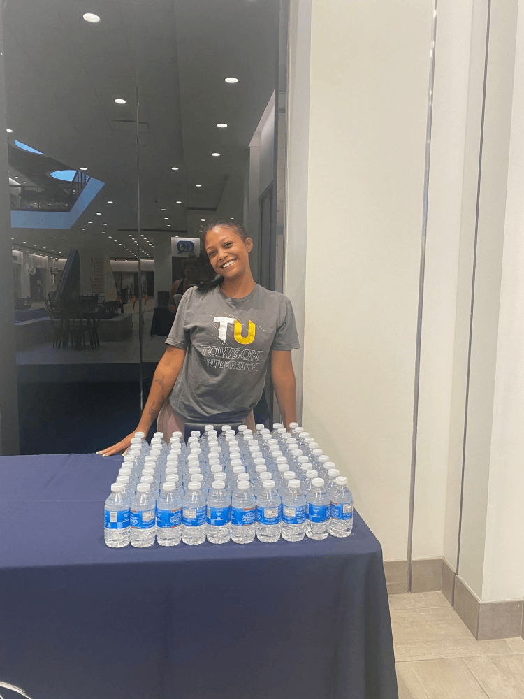 girl with water bottles