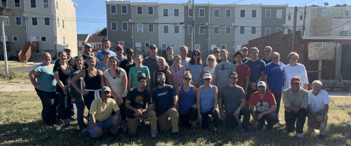 volunteers clicking group picture